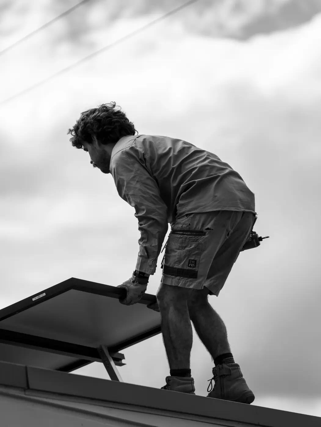 Newy Solar Co electrician working on a Glen William solar installation